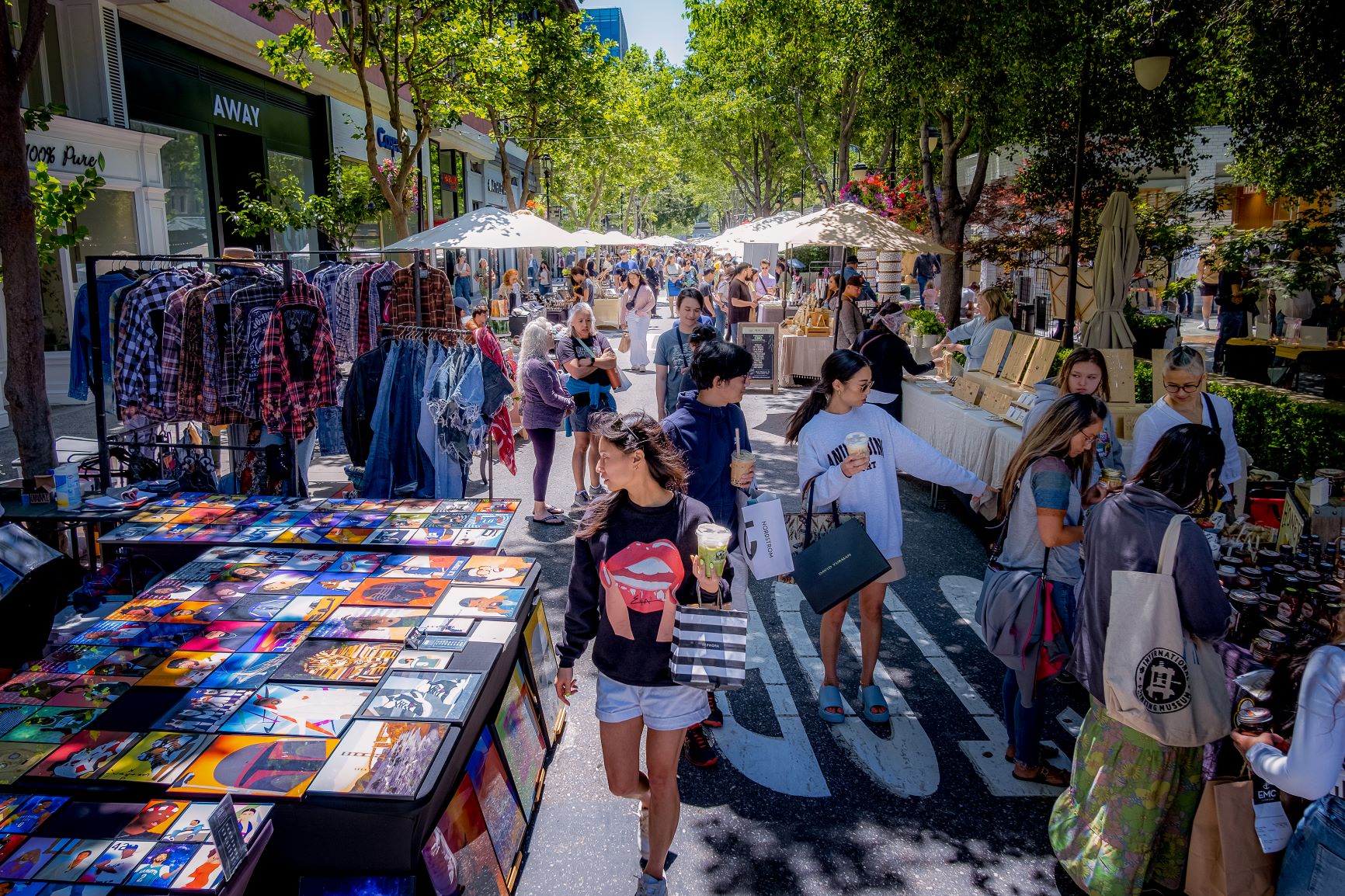 Makers Market street fair at Santana Row with makers' booths and shoppers