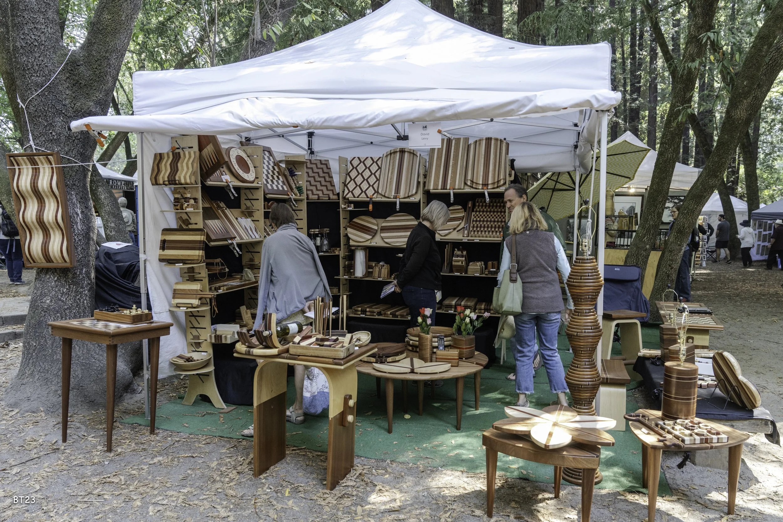 Artist booths with wood work at the festival