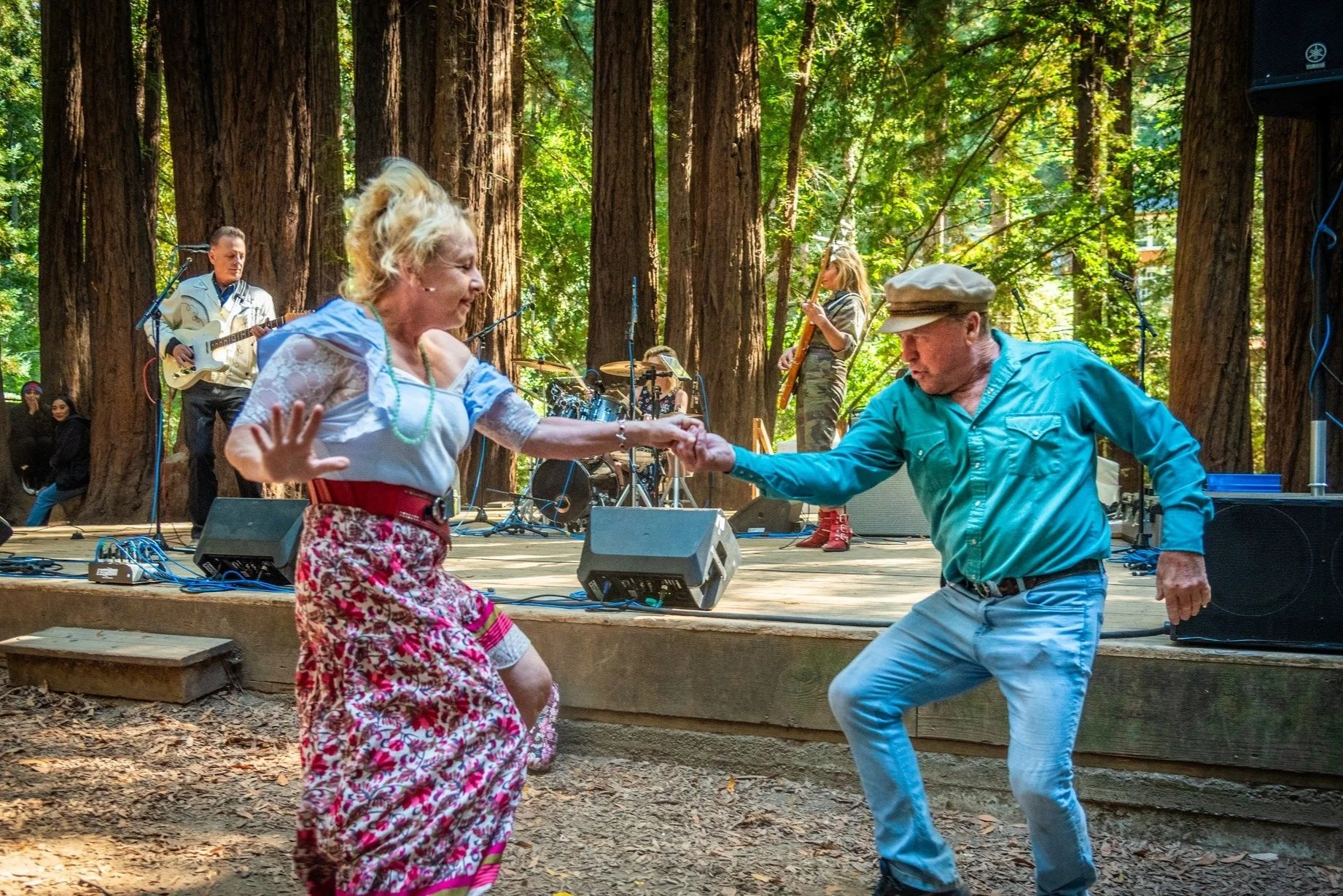 Festival visitors dancing to live music in 2023